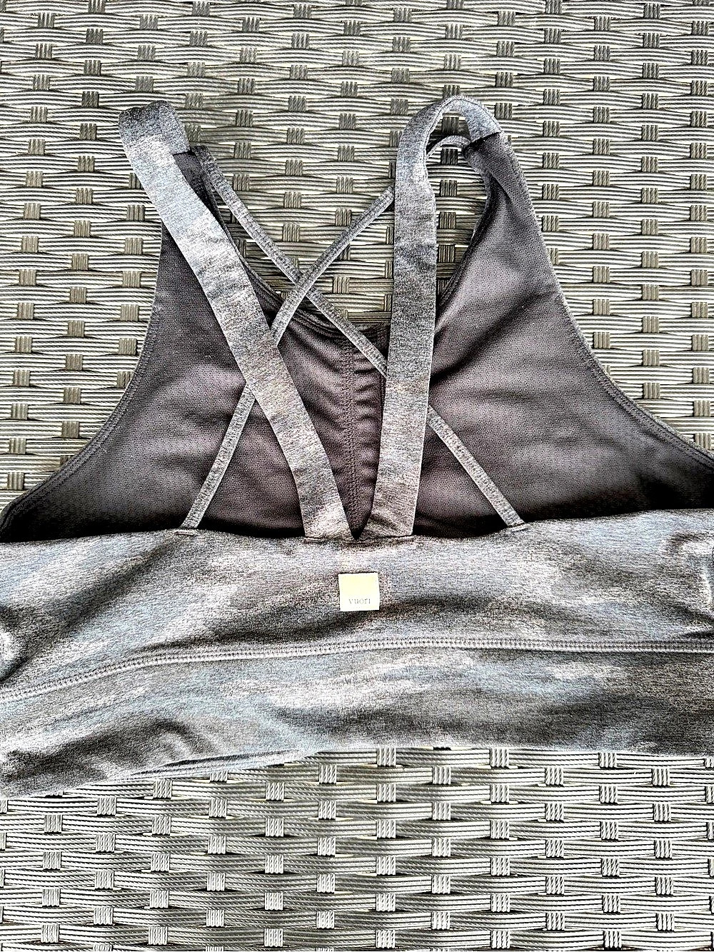 Vuori Elevation Bra in a black and grey camo large